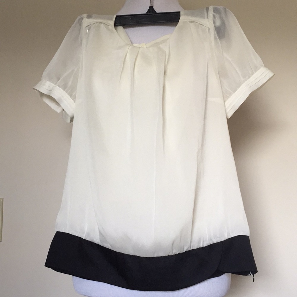 Off white blouse.